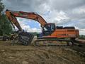 Просеивающий ковш на Hitachi-450 для переработки материалов